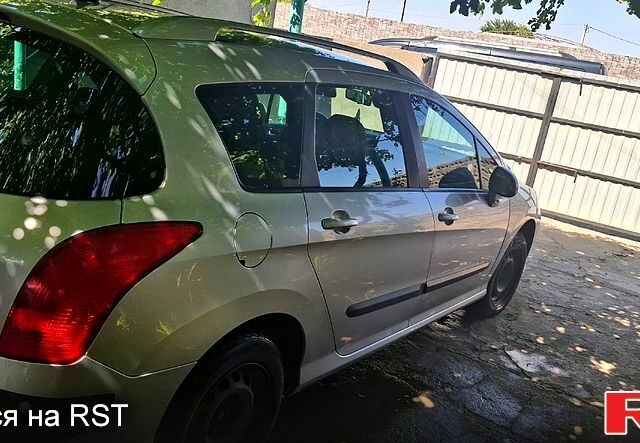 Серый Пежо 308, объемом двигателя 1.6 л и пробегом 245 тыс. км за 5000 $, фото 1 на Automoto.ua