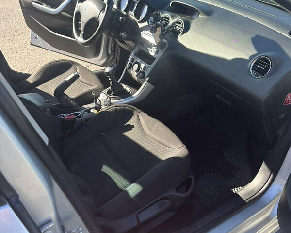 Пежо 308 2009 в Львове на Automoto.ua Серый Пежо 308, объемом двигателя 1.6 л и пробегом 490 тыс. км за 5500 $, фото 10 на Automoto.ua