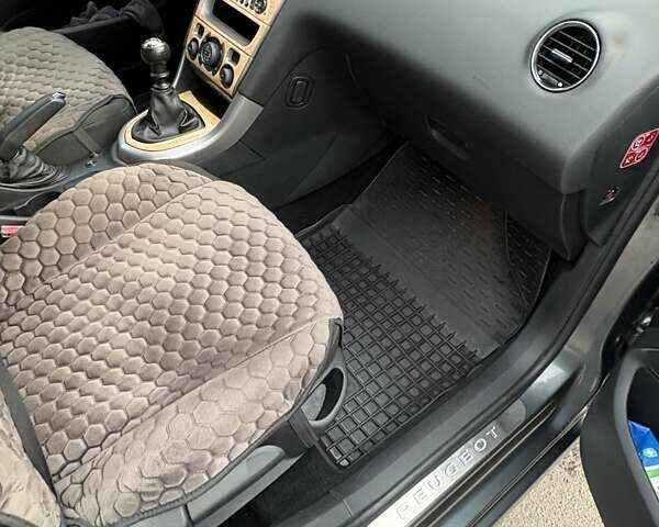 Серый Пежо 308, объемом двигателя 1.56 л и пробегом 277 тыс. км за 5200 $, фото 11 на Automoto.ua