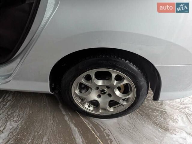 Серый Пежо 308, объемом двигателя 1.6 л и пробегом 202 тыс. км за 5250 $, фото 6 на Automoto.ua