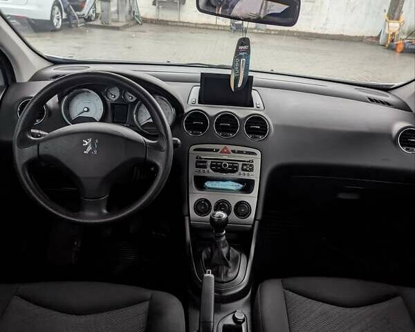 Серый Пежо 308, объемом двигателя 1.6 л и пробегом 202 тыс. км за 5250 $, фото 9 на Automoto.ua