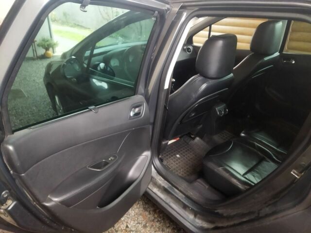 Серый Пежо 308, объемом двигателя 1.6 л и пробегом 250 тыс. км за 5500 $, фото 8 на Automoto.ua