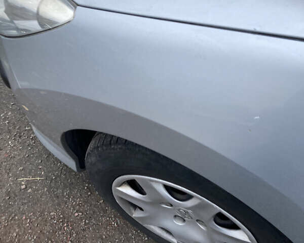 Серый Пежо 308, объемом двигателя 1.56 л и пробегом 238 тыс. км за 5500 $, фото 17 на Automoto.ua