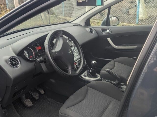 Серый Пежо 308, объемом двигателя 1 л и пробегом 138 тыс. км за 6200 $, фото 7 на Automoto.ua