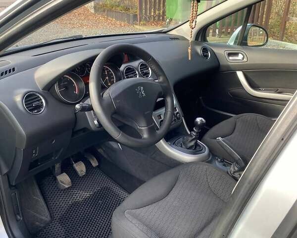 Серый Пежо 308, объемом двигателя 1.56 л и пробегом 255 тыс. км за 5400 $, фото 13 на Automoto.ua
