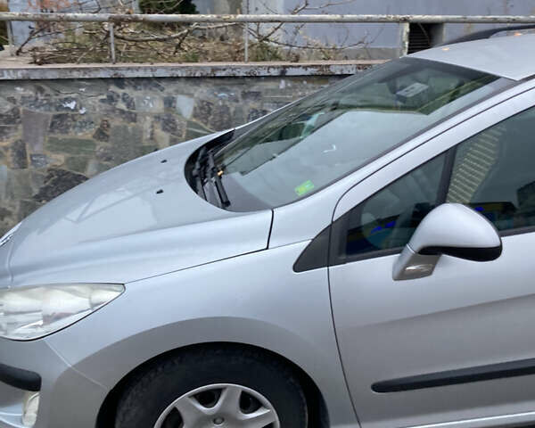 Серый Пежо 308, объемом двигателя 1.56 л и пробегом 238 тыс. км за 5500 $, фото 12 на Automoto.ua