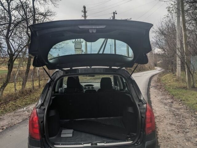 Серый Пежо 308, объемом двигателя 1 л и пробегом 138 тыс. км за 6200 $, фото 3 на Automoto.ua