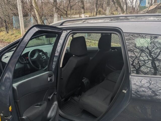 Серый Пежо 308, объемом двигателя 1 л и пробегом 138 тыс. км за 6200 $, фото 6 на Automoto.ua