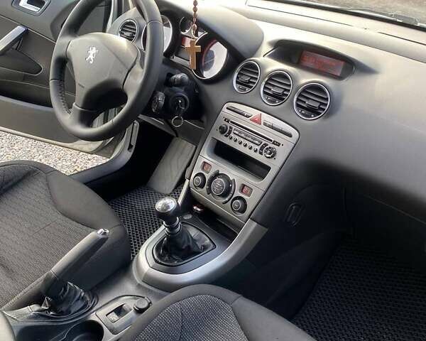 Серый Пежо 308, объемом двигателя 1.56 л и пробегом 255 тыс. км за 5400 $, фото 24 на Automoto.ua