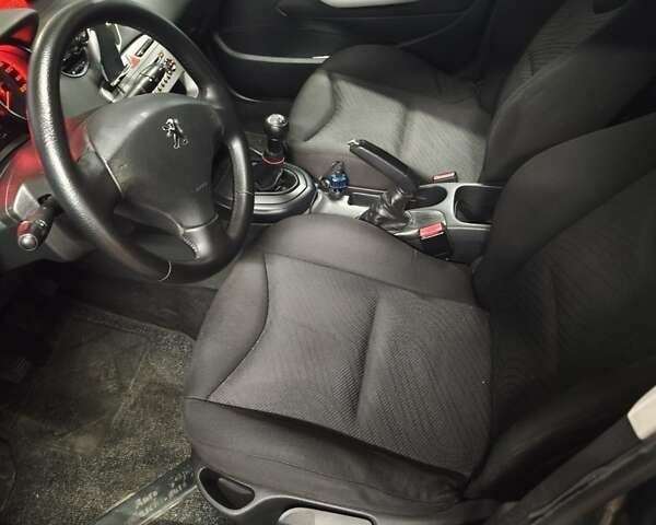 Серый Пежо 308, объемом двигателя 1.6 л и пробегом 248 тыс. км за 5500 $, фото 7 на Automoto.ua