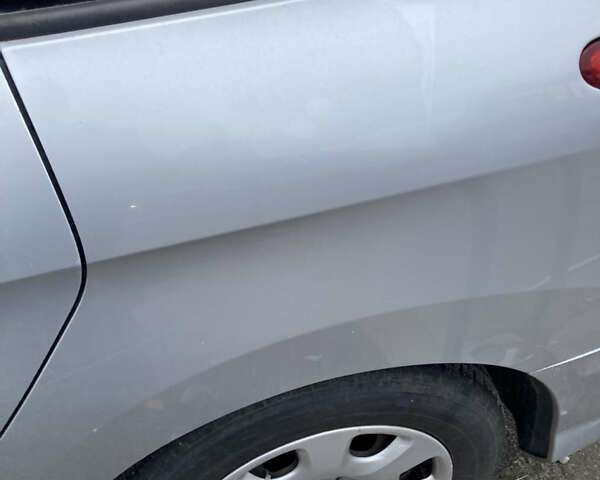 Серый Пежо 308, объемом двигателя 1.56 л и пробегом 238 тыс. км за 5500 $, фото 5 на Automoto.ua