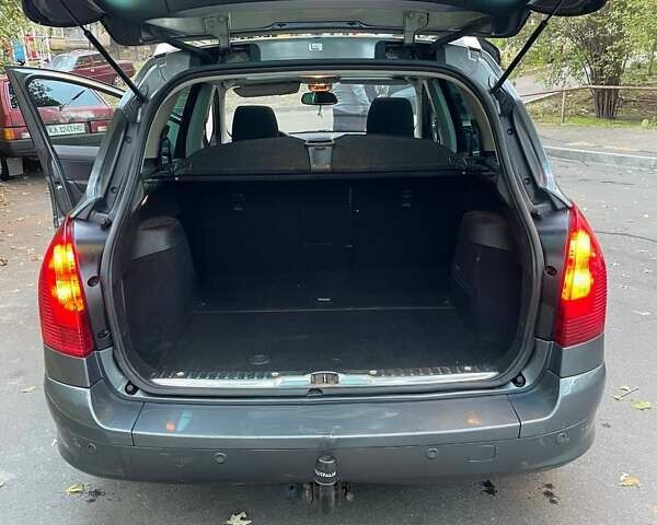 Серый Пежо 308, объемом двигателя 1.6 л и пробегом 345 тыс. км за 5500 $, фото 4 на Automoto.ua