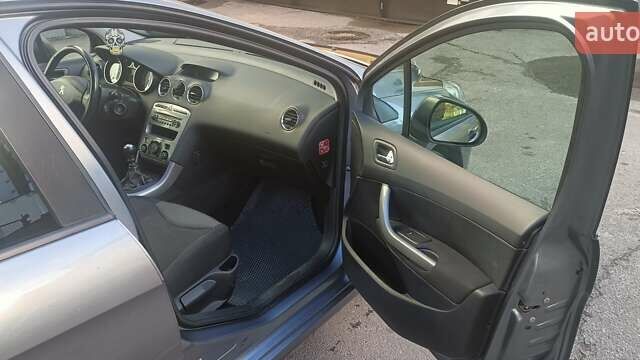 Сірий Пежо 308, об'ємом двигуна 1.56 л та пробігом 248 тис. км за 6050 $, фото 7 на Automoto.ua