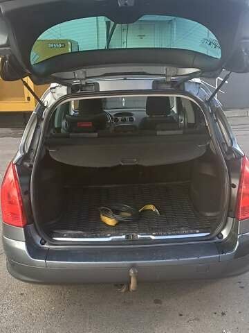 Сірий Пежо 308, об'ємом двигуна 1.56 л та пробігом 248 тис. км за 6050 $, фото 4 на Automoto.ua