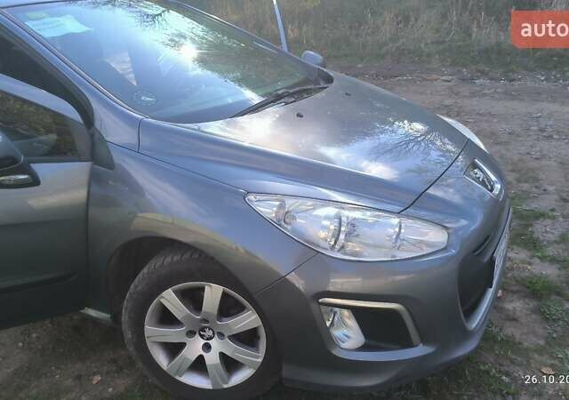 Серый Пежо 308, объемом двигателя 1.56 л и пробегом 200 тыс. км за 6950 $, фото 11 на Automoto.ua