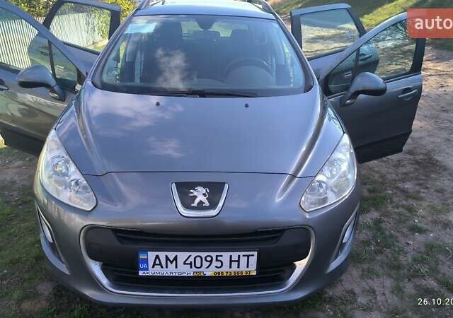 Серый Пежо 308, объемом двигателя 1.56 л и пробегом 200 тыс. км за 6950 $, фото 12 на Automoto.ua