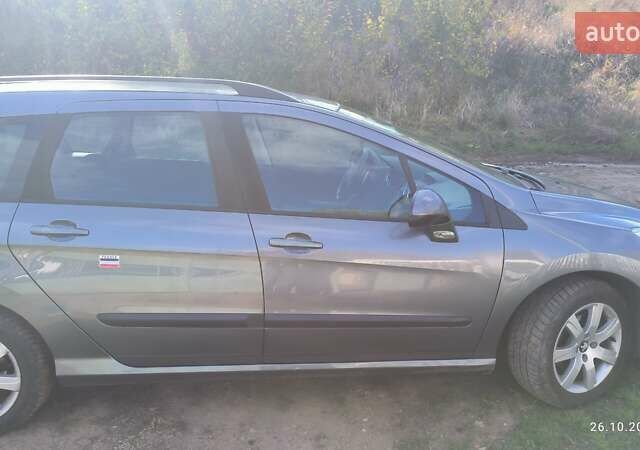 Серый Пежо 308, объемом двигателя 1.56 л и пробегом 200 тыс. км за 6950 $, фото 1 на Automoto.ua