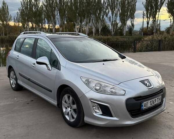 Сірий Пежо 308, об'ємом двигуна 1.56 л та пробігом 250 тис. км за 4899 $, фото 3 на Automoto.ua