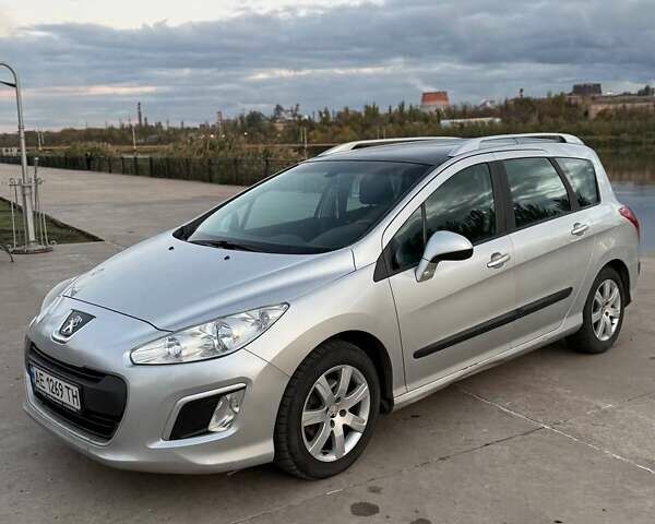 Сірий Пежо 308, об'ємом двигуна 1.56 л та пробігом 250 тис. км за 4899 $, фото 1 на Automoto.ua
