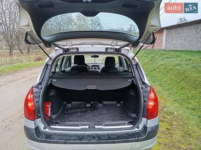 Серый Пежо 308, объемом двигателя 1.6 л и пробегом 245 тыс. км за 6000 $, фото 19 на Automoto.ua