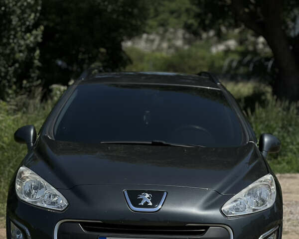 Серый Пежо 308, объемом двигателя 1.56 л и пробегом 260 тыс. км за 6500 $, фото 2 на Automoto.ua