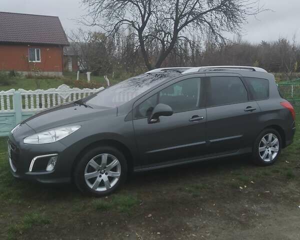 Серый Пежо 308, объемом двигателя 1.6 л и пробегом 260 тыс. км за 7000 $, фото 1 на Automoto.ua