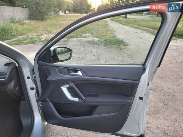 Серый Пежо 308, объемом двигателя 2 л и пробегом 141 тыс. км за 11200 $, фото 17 на Automoto.ua