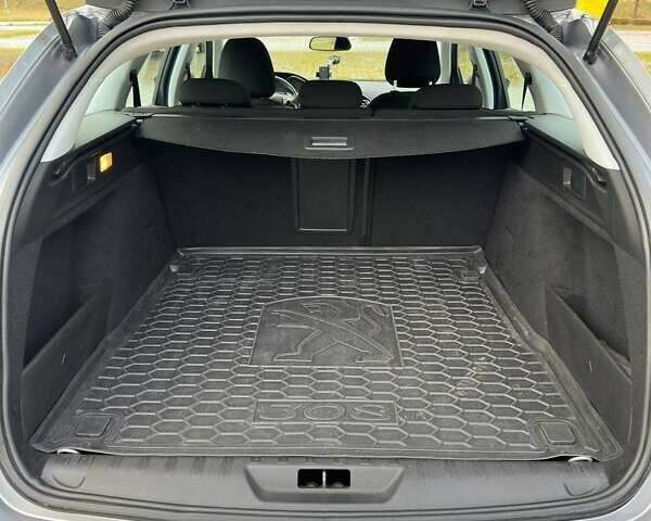 Серый Пежо 308, объемом двигателя 1.56 л и пробегом 214 тыс. км за 10500 $, фото 13 на Automoto.ua