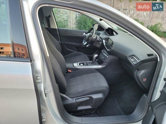 Серый Пежо 308, объемом двигателя 2 л и пробегом 141 тыс. км за 11200 $, фото 16 на Automoto.ua