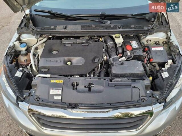 Серый Пежо 308, объемом двигателя 2 л и пробегом 141 тыс. км за 11200 $, фото 25 на Automoto.ua