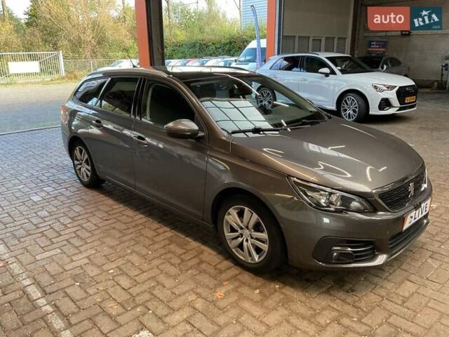 Серый Пежо 308, объемом двигателя 1.2 л и пробегом 161 тыс. км за 11200 $, фото 14 на Automoto.ua