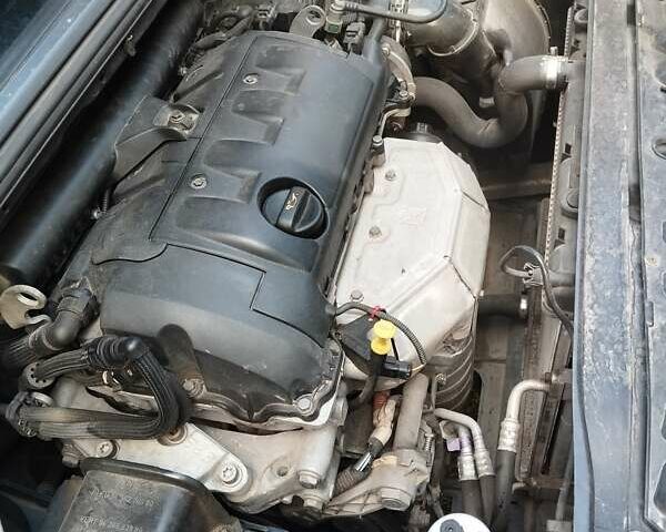 Синий Пежо 308, объемом двигателя 1.6 л и пробегом 206 тыс. км за 4600 $, фото 16 на Automoto.ua