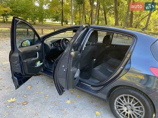Синий Пежо 308, объемом двигателя 1.6 л и пробегом 232 тыс. км за 6500 $, фото 12 на Automoto.ua