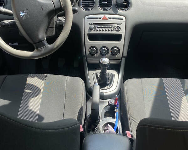 Синий Пежо 308, объемом двигателя 1.4 л и пробегом 118 тыс. км за 5700 $, фото 10 на Automoto.ua