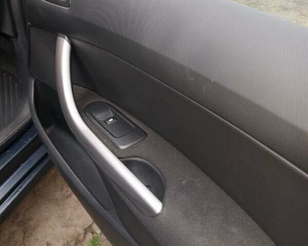 Синий Пежо 308, объемом двигателя 1.56 л и пробегом 204 тыс. км за 4750 $, фото 10 на Automoto.ua