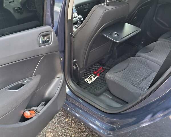 Синій Пежо 308, об'ємом двигуна 1.61 л та пробігом 240 тис. км за 6800 $, фото 19 на Automoto.ua