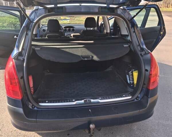 Синий Пежо 308, объемом двигателя 1.6 л и пробегом 165 тыс. км за 6000 $, фото 9 на Automoto.ua