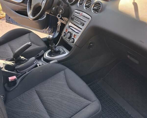 Синий Пежо 308, объемом двигателя 1.6 л и пробегом 165 тыс. км за 6000 $, фото 11 на Automoto.ua
