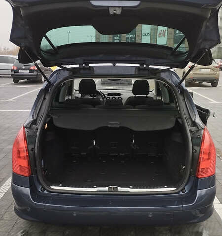 Синий Пежо 308, объемом двигателя 1.6 л и пробегом 229 тыс. км за 5400 $, фото 13 на Automoto.ua