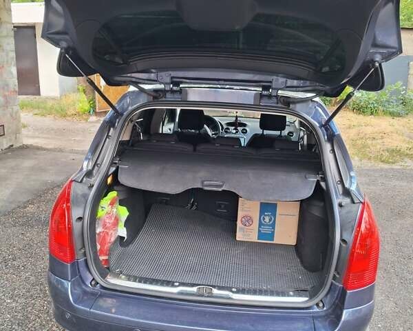 Синій Пежо 308, об'ємом двигуна 1.61 л та пробігом 240 тис. км за 6800 $, фото 14 на Automoto.ua
