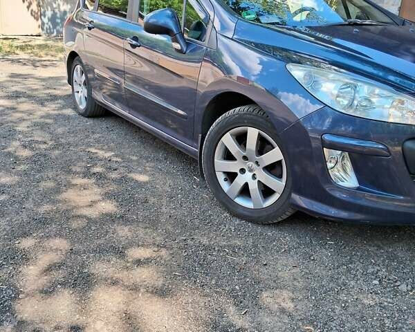 Синій Пежо 308, об'ємом двигуна 1.61 л та пробігом 240 тис. км за 6800 $, фото 10 на Automoto.ua