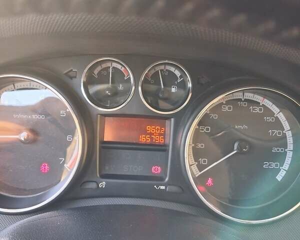 Синий Пежо 308, объемом двигателя 1.6 л и пробегом 165 тыс. км за 6000 $, фото 5 на Automoto.ua