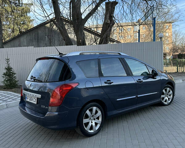 Синий Пежо 308, объемом двигателя 1.6 л и пробегом 303 тыс. км за 4900 $, фото 4 на Automoto.ua