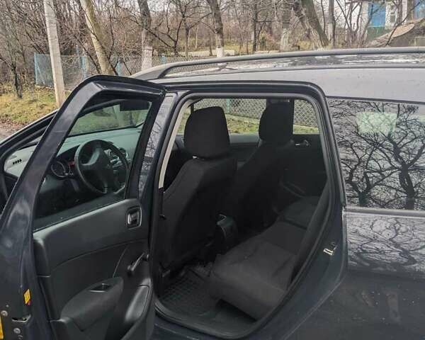Синій Пежо 308, об'ємом двигуна 1.56 л та пробігом 139 тис. км за 6200 $, фото 10 на Automoto.ua