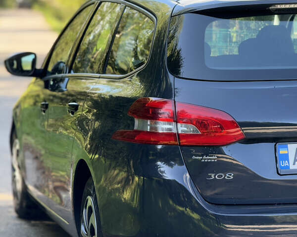 Синий Пежо 308, объемом двигателя 1.56 л и пробегом 218 тыс. км за 9600 $, фото 18 на Automoto.ua