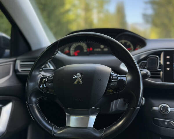 Синий Пежо 308, объемом двигателя 1.56 л и пробегом 218 тыс. км за 9600 $, фото 12 на Automoto.ua
