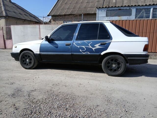 Білий Пежо 309, об'ємом двигуна 1.6 л та пробігом 150 тис. км за 700 $, фото 2 на Automoto.ua