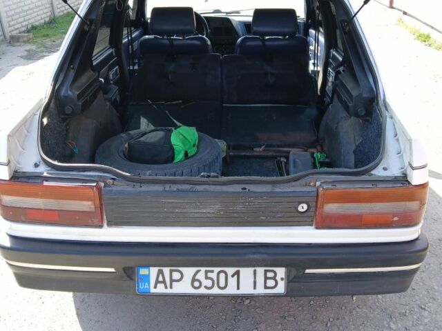 Білий Пежо 309, об'ємом двигуна 1.6 л та пробігом 150 тис. км за 700 $, фото 3 на Automoto.ua
