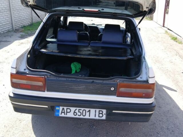 Білий Пежо 309, об'ємом двигуна 1.6 л та пробігом 150 тис. км за 700 $, фото 7 на Automoto.ua