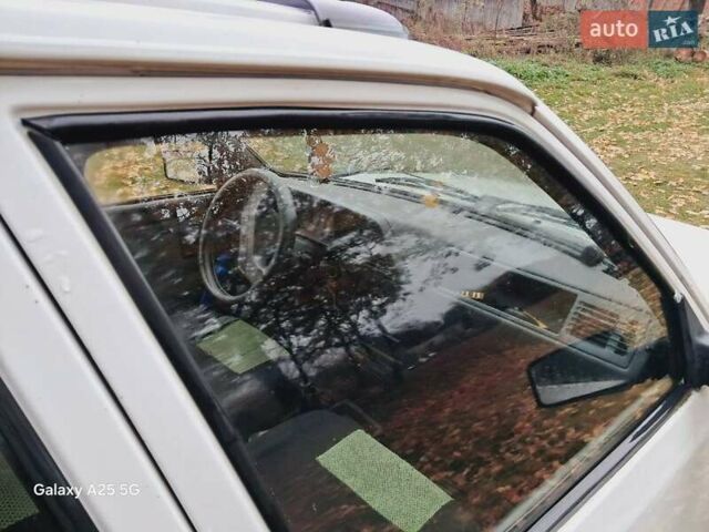 Белый Пежо 309, объемом двигателя 1.3 л и пробегом 300 тыс. км за 800 $, фото 3 на Automoto.ua